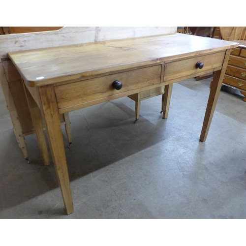 65 - A Victorian pine two drawer side table