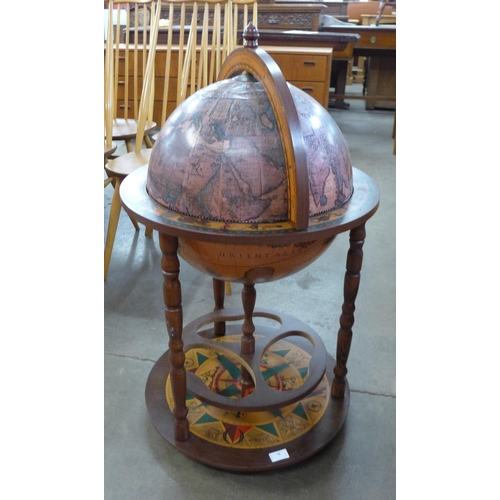 68 - An Italian terrestrial globe cocktail cabinet/trolley