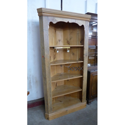 81 - A George III style pine freestanding corner cabinet