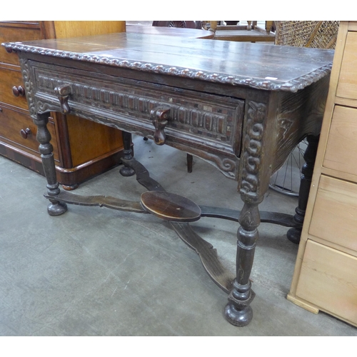 93 - A 17th Century Dutch carved oak single drawer side table