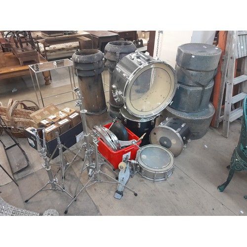 234 - A vintage Pearl drum kit and cases