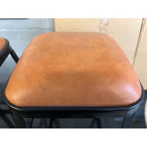 1635 - A black granite circular pub table and four industrial style stools