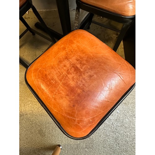 1636 - A grey marble circular pub table and four industrial style stools