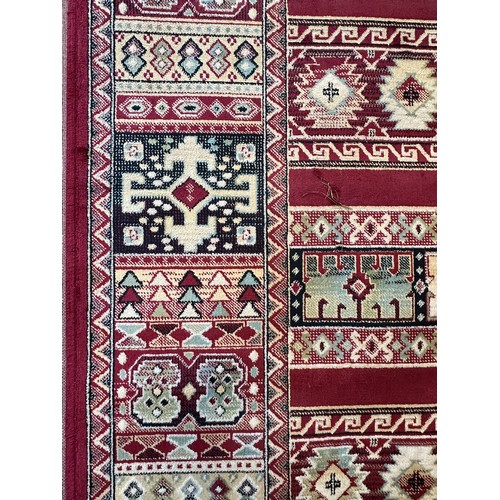 1586 - A rich red ground Kashan rug with bespoke all-over design (170cm x 120cm)