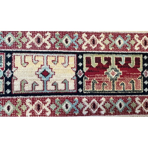 1586 - A rich red ground Kashan rug with bespoke all-over design (170cm x 120cm)