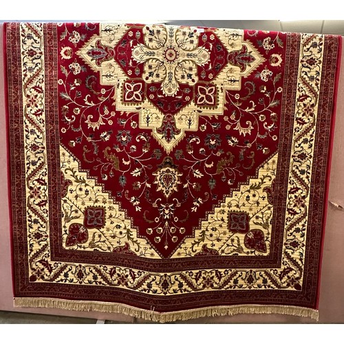 1587 - A red ground full pile cashmere carpet with unique medallion design (300cm x 200cm)