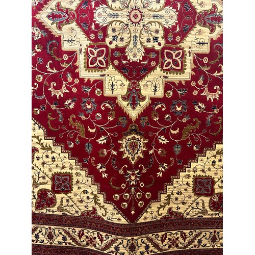 1587 - A red ground full pile cashmere carpet with unique medallion design (300cm x 200cm)