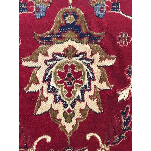 1587 - A red ground full pile cashmere carpet with unique medallion design (300cm x 200cm)