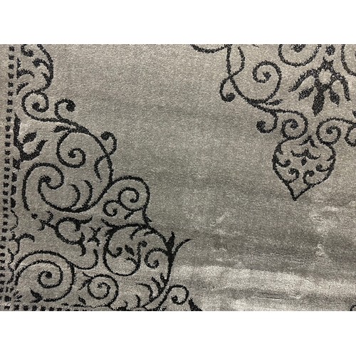 1588 - A grey and black full pile designer rug (230cm x 160cm(