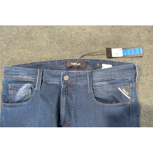 3077 - Four pairs of men's branded jeans: Replay & Lee - mixed sizes and styles * this lot is subject to VA... 