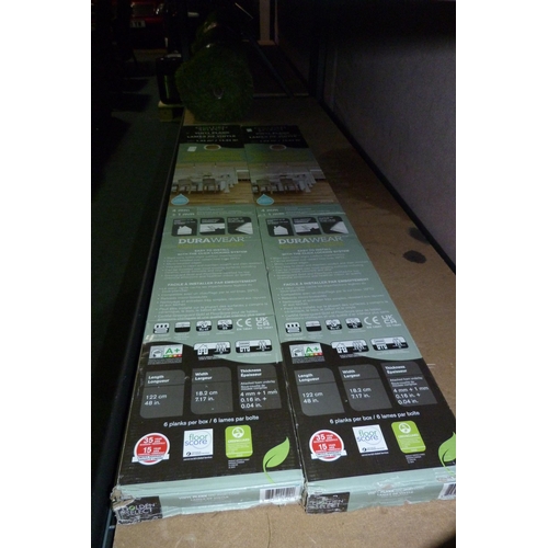 3379 - Two Packs of Summerwood Vinyl Flooring  (305-29)    * This lot is subject to vat