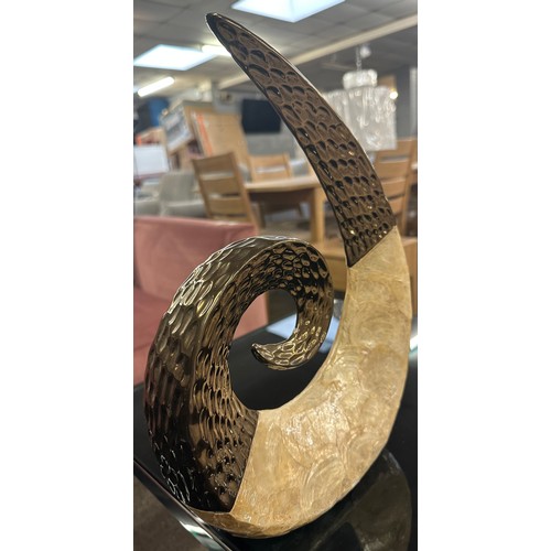 1518 - A Capiz shell swirl sculpture