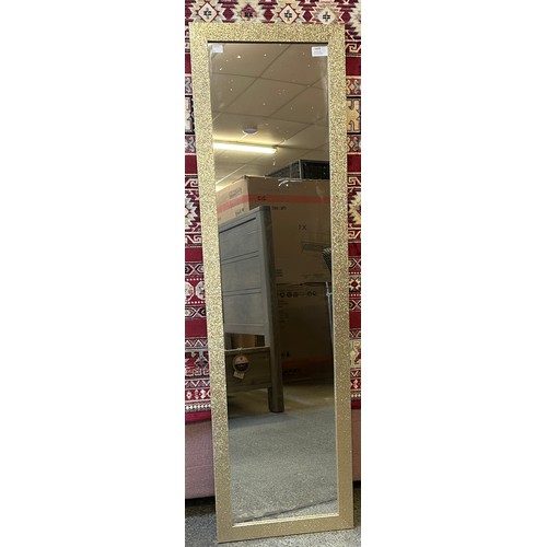 1609 - A gold glitter framed mirror (126.5cm x 36.5cm)