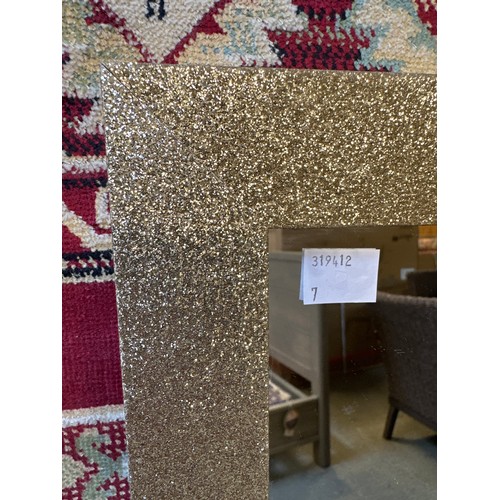 1609 - A gold glitter framed mirror (126.5cm x 36.5cm)