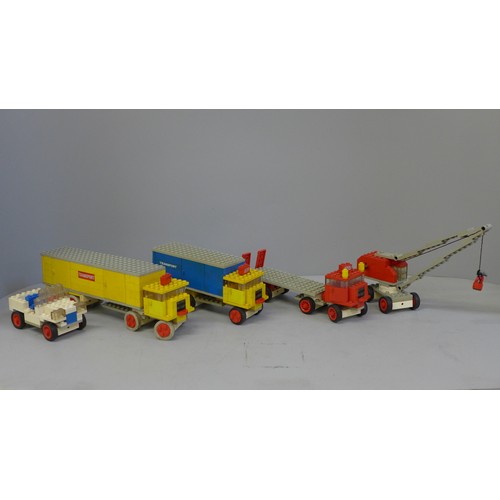 765 - A collection of Lego from 1960s, complete models with instructions from 330 Series; Trucks, Cranes, ... 