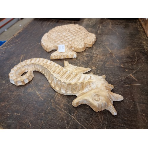 2131 - Ceramic seahorse and fish wall hangings