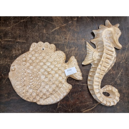 2131 - Ceramic seahorse and fish wall hangings