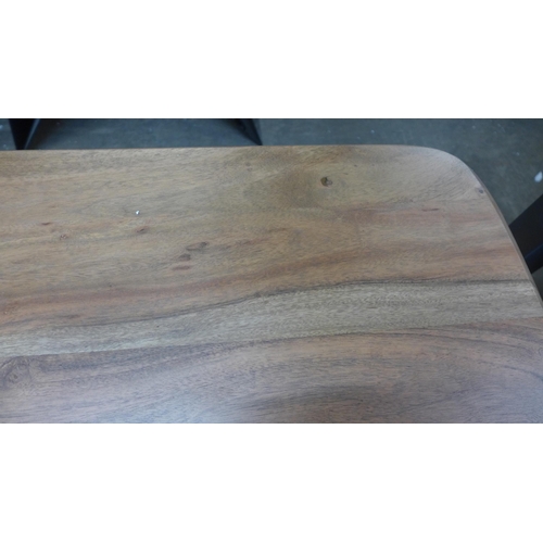 1403 - A Lucio hardwood dining table and two benches * This lot is subject to VAT