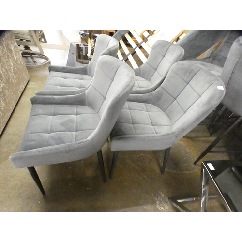 1405 - A set of four Kos dining chairs * this lot is subject to VAT