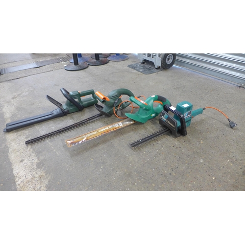 2263 - Four electric hedge cutters