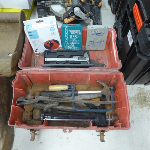 2018 - A toolbox with hammers, calipers and drill bits