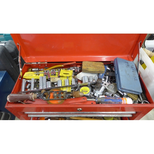 2032 - A red metal toolbox with sliding drawers including a quantity of mixed tools including sockets, scre... 