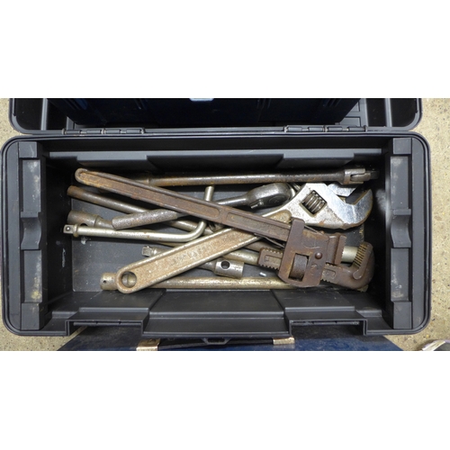 2035 - Two plastic tool boxes including an assortment of tools including a quantity of spanners, a small wo... 