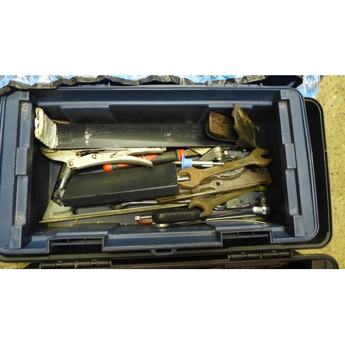 2035 - Two plastic tool boxes including an assortment of tools including a quantity of spanners, a small wo... 