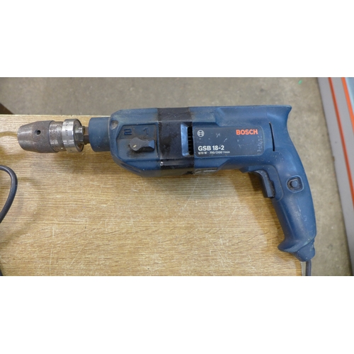 2051 - A quantity of power tools including Bosch PMF180E multi tool, Bosch grinder, Black & Decker heat gun... 