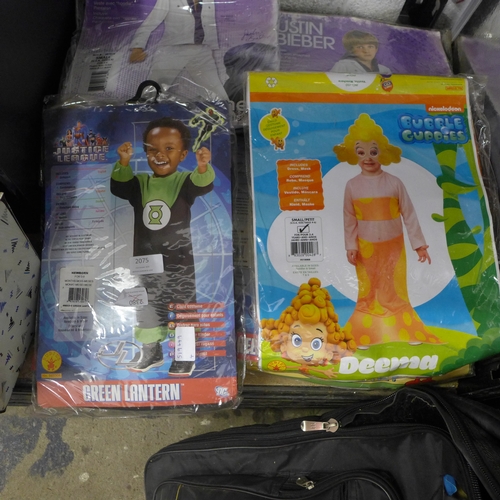 2075 - A box of children's fancy dress costumes including Smurfs, Green Lantern and Justin Beiber