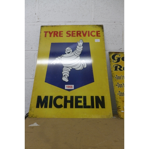 2100 - A Michelin Man sign