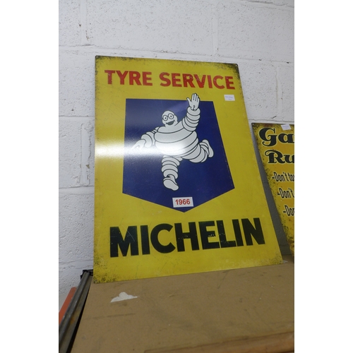 2100 - A Michelin Man sign