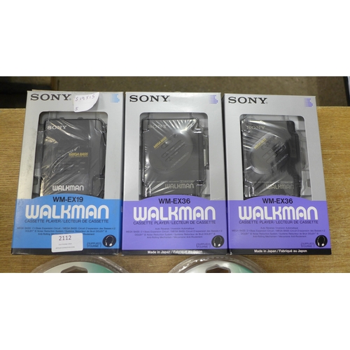 2112 - Two Sony WM-EX36 cassette player Walkmans, a Sony WM-EX19 cassette player Walkman and two Sony CD Wa... 