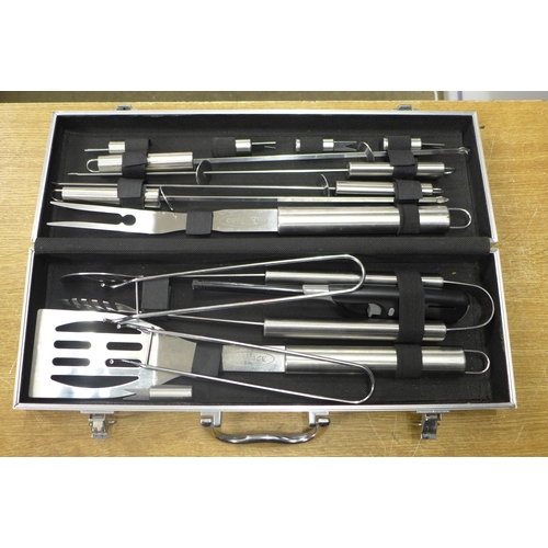 2119 - A BBQ set including utensils