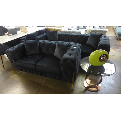 1301 - A Matrix black buttoned velvet three and two seater sofa * This lot is subject to VAT