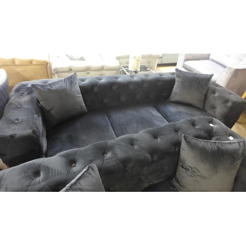 1301 - A Matrix black buttoned velvet three and two seater sofa * This lot is subject to VAT