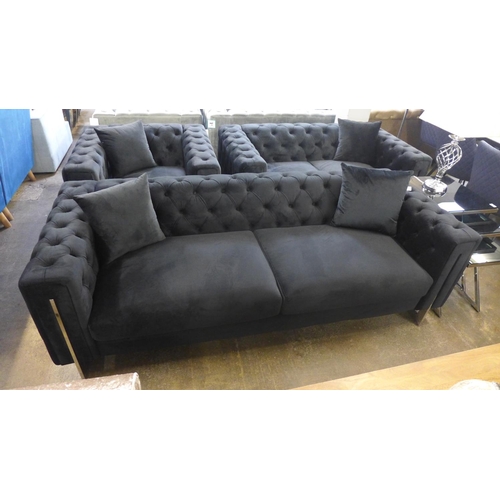 1304 - A Fenzi black buttoned velvet three seater sofa, two seater sofa and armchair * This lot is subject ... 