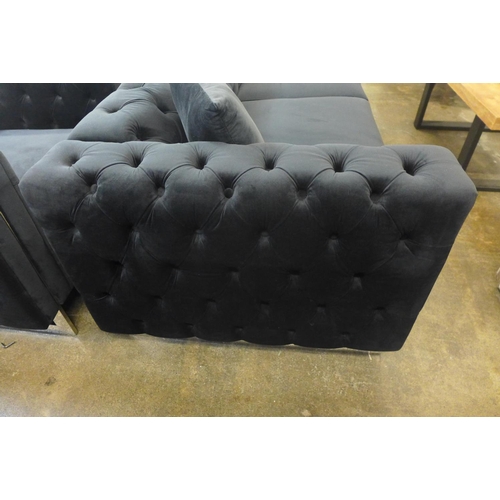 1304 - A Fenzi black buttoned velvet three seater sofa, two seater sofa and armchair * This lot is subject ... 