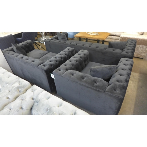 1304 - A Fenzi black buttoned velvet three seater sofa, two seater sofa and armchair * This lot is subject ... 