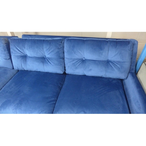 1451 - A blue velvet corner sofa