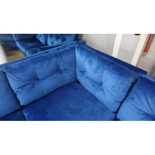 1451 - A blue velvet corner sofa