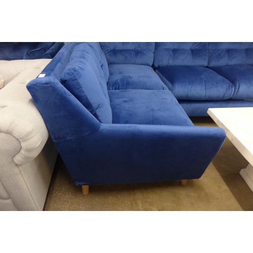 1451 - A blue velvet corner sofa