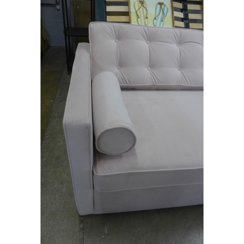 1473 - A pink velvet metal action oversized sofa bed