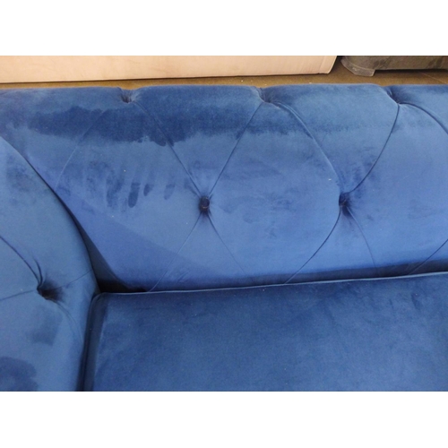 1491 - A blue velvet Chesterfield metal action sofa bed