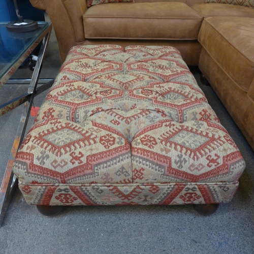 1496 - A tan vegan leather corner sofa and contrasting Aztec patterned footstool and scatter cushions