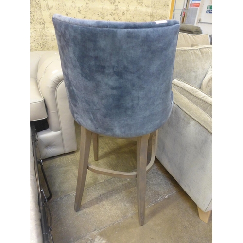 1500 - A blue upholstered buttoned bar stool