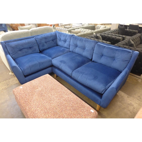 1505 - A blue velvet corner sofa