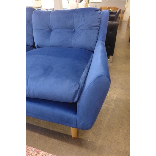 1505 - A blue velvet corner sofa