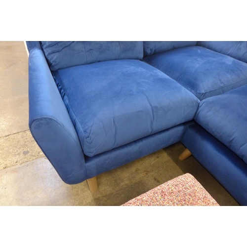 1505 - A blue velvet corner sofa