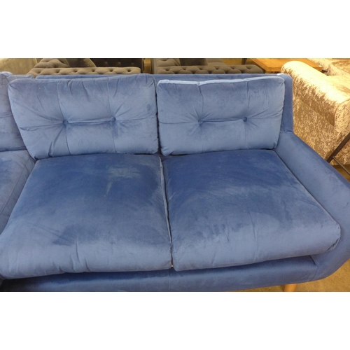 1505 - A blue velvet corner sofa